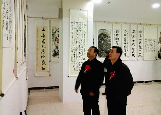 全国书画名家邀请展暨枣庄市残疾人书画家协会成立大会在枣庄新城举��?(02).jpg