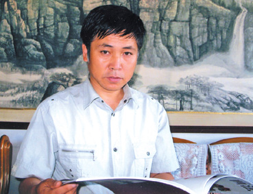 王义英——书画界新闻人物献礼全国两会